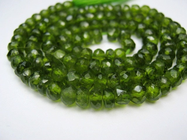 Vessonite (Vesuvianite) Gemstone.  Faceted Rondelles, 4.5mm. Packet of 8.  (6VES)