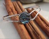 Sterling Silver Cuff Bracelet with Large Pau Shell. Large round stone. Open wavy abstract silver. textured and raised design.OOAK
