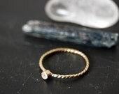 A simple 14k gold filled stackable Dot  ring