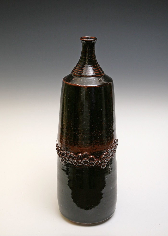 Very Tall Wheel Thrown Stoneware bottle in black glaze with organic pattern