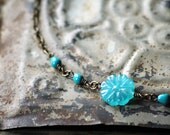 asymmetrical turquoise flower necklace