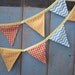 Small Classic Bunting. Fabric Patterns - Chevron, Gingham, Circles. Colours -  Turquoise, Orange, Light orange.