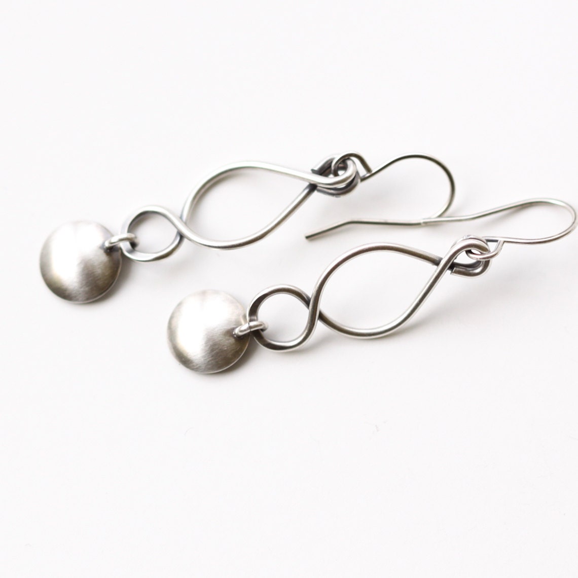 Matte silver earrings in a simple contemporary jewelry design perfect and lightweight for everyday wear - "Swirls and Flourish Earrings"