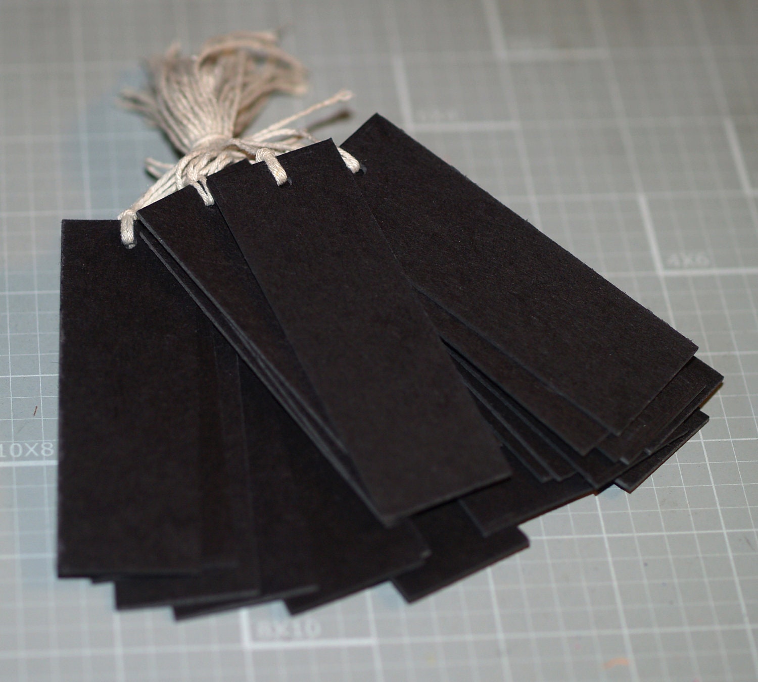 Black Label ... 50 Tags . Jet Black . Chipboard . Natural Twine Ties . Basic . Heavy Duty . Rustic . Sturdy . Thick . Cardstock