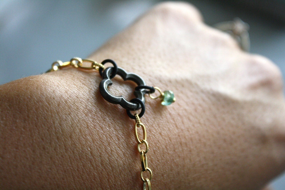 Arm Candy - small black quatrefoil clover flower with sea green bead charm gold chain bracele - gifts under 15