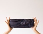 Leather long clutch with a knot , handbag in Blue