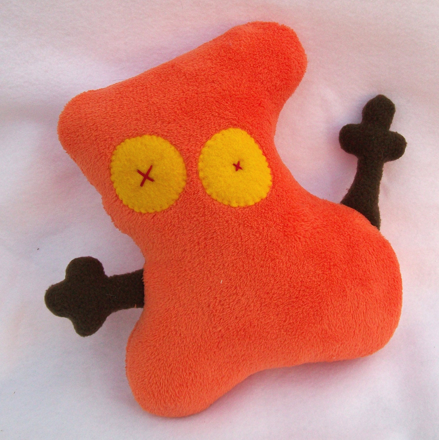 Orange blob with yellow eyes - silly plush