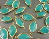 5072G-MT (2 pcs) Medium Turquoise / Gold Faceted marquise glass with bezel connectors