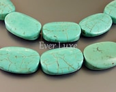 LE-024 (4 pcs) Howlite Turquoise 18mm x 25mm large smooth slightly curved oval beads