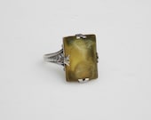 Art Deco Sterling Silver Uncas Ring with Olive Lucite Stone