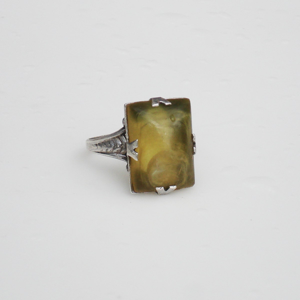 Art Deco Sterling Silver Uncas Ring with Olive Lucite Stone