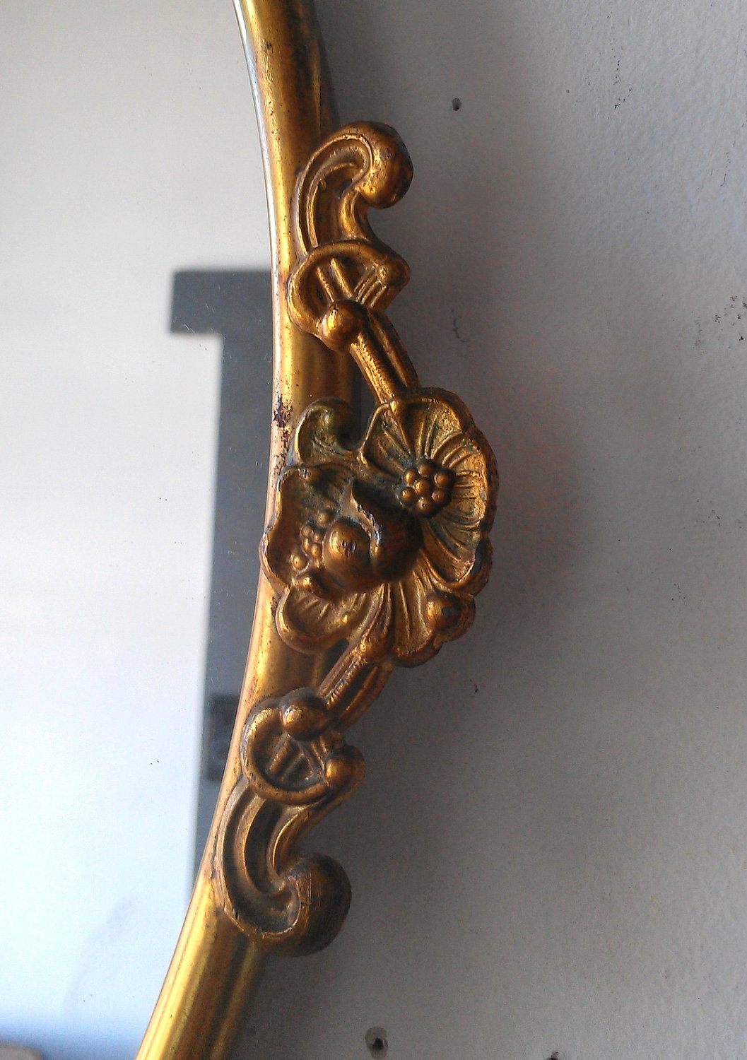 Antique Oval Mirror in Ornate Brass Frame 19 by 12 inches