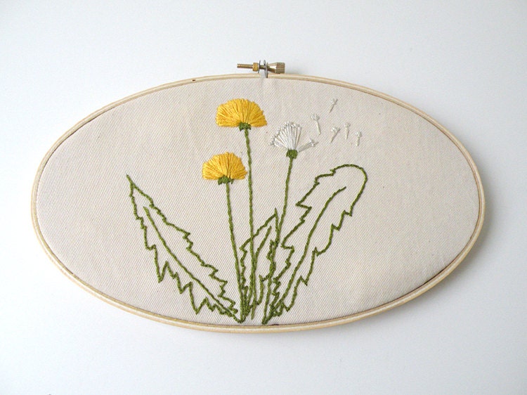 Embroidered dandelions on cream cotton wood embroidery oval hoop