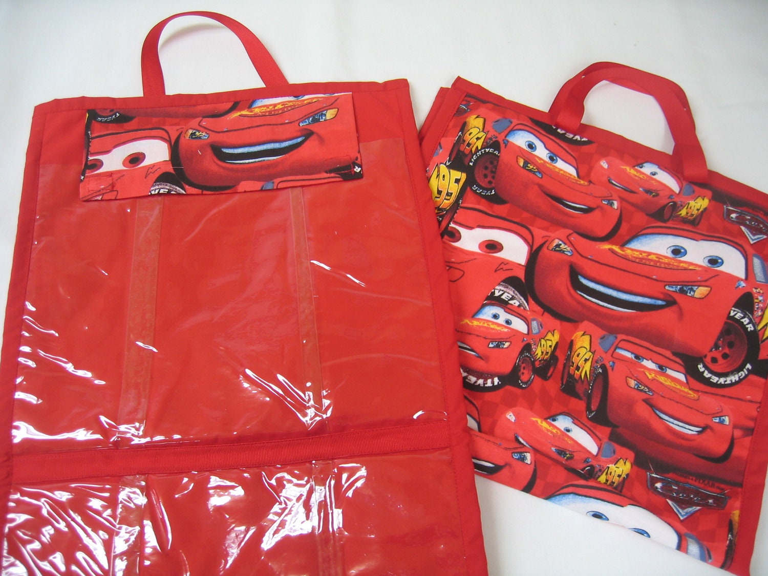 Toy Tote with 2 large pockets for carrying toys in a red CARS print