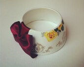 StayGoldMaryRose - Beautiful gold regal crest with gold rose pattern tea cup bracelet with rich gold handmade satin bow.
