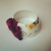 StayGoldMaryRose - Beautiful gold regal crest with gold rose pattern tea cup bracelet with rich gold handmade satin bow.