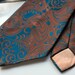Vintage Strange of London 70s Men's Brown and Teal Paisley Necktie