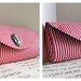 Nautical clutch purse with blue anchor cameo. Red and white stripes. Made to order