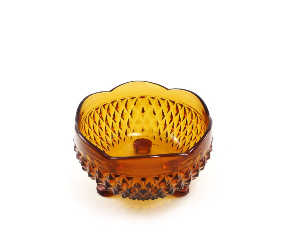 Amber glass candy dish - vintage honey gold brown cut glass footed bowl