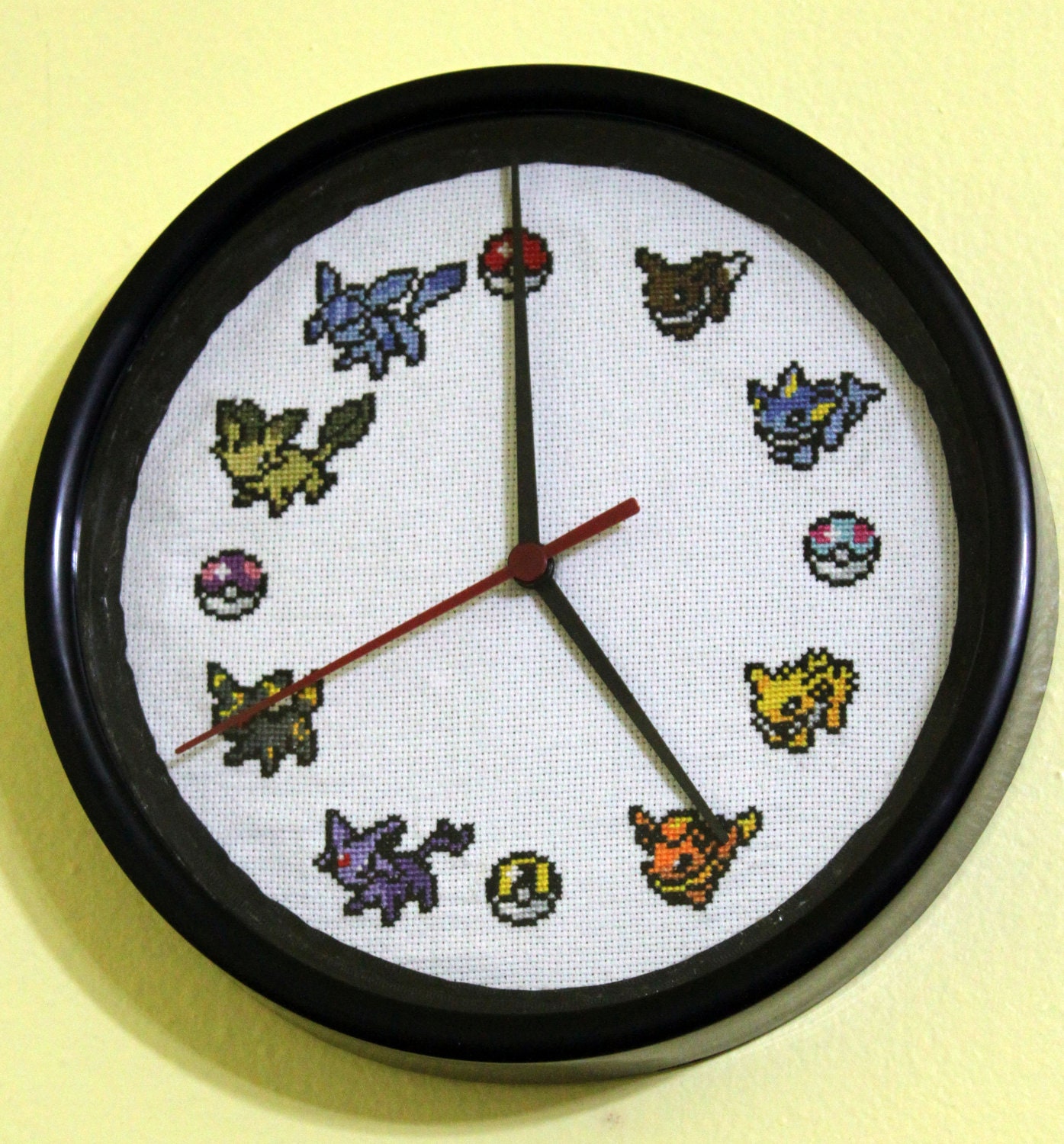 Eeveelution Cross Stitched Clock