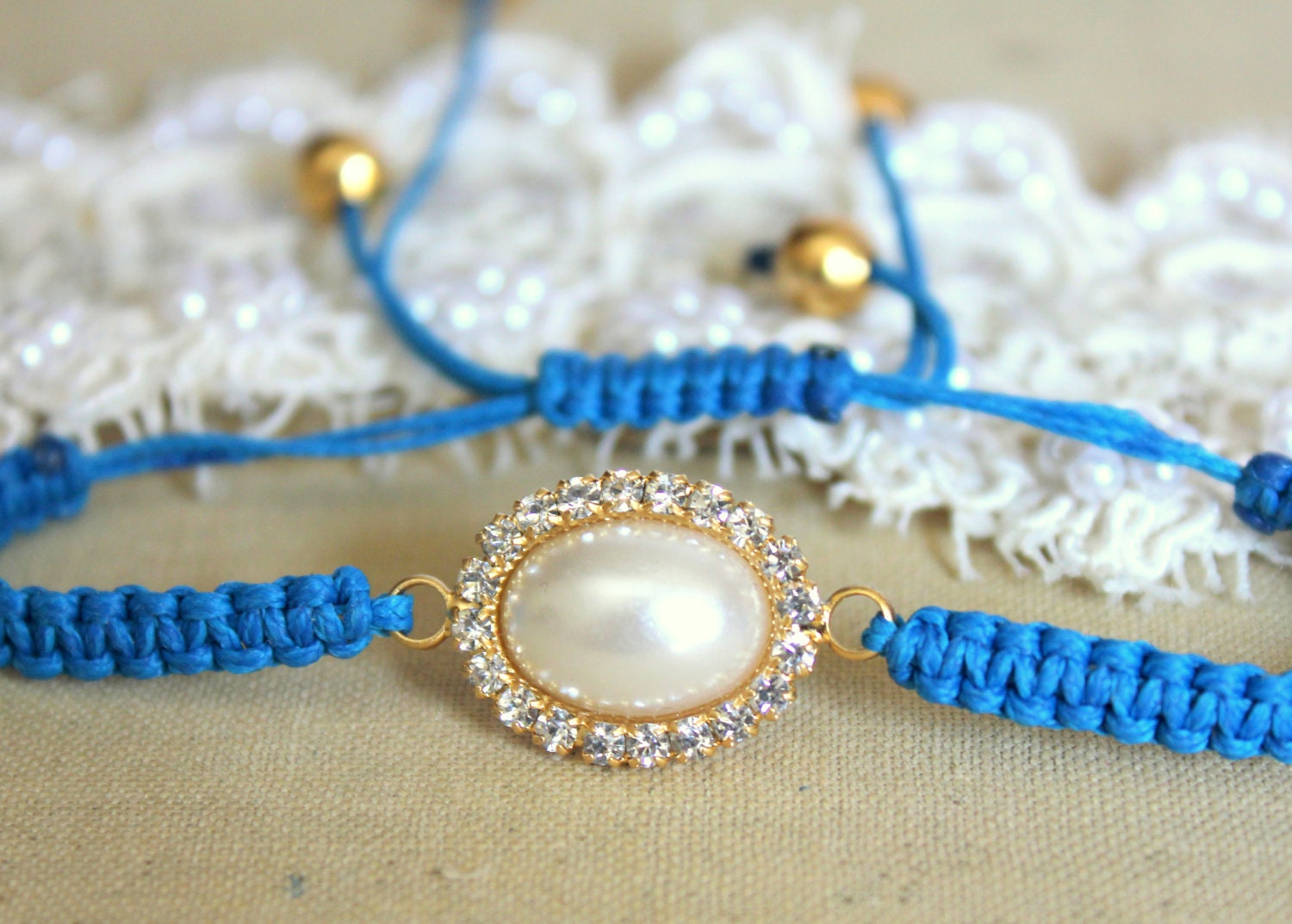 Blue Friendship bracelet braded with pearls and swarovski rhinestones