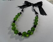 Peridot Glass and Black Satin Ribbon