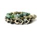 moss agate bracelet with gold focal bead. small stacking yoga stretch bracelet in green, teal, olive and aquamarine.