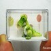 Tiny Green Tyrannosaurus - Dollhouse Miniature Dinosaurs - One Inch Scale - Micro Crochet Dinosaur - Made To Order