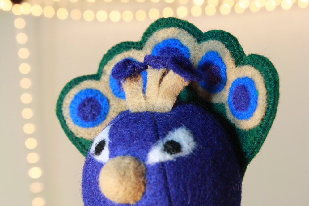 roly poly peacock doll