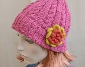 knitted pink cap/hat with felt flower
