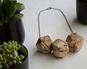 Faceted maple trio necklace