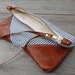 T R A V E L collection Grey and white striped pouch with leather corners