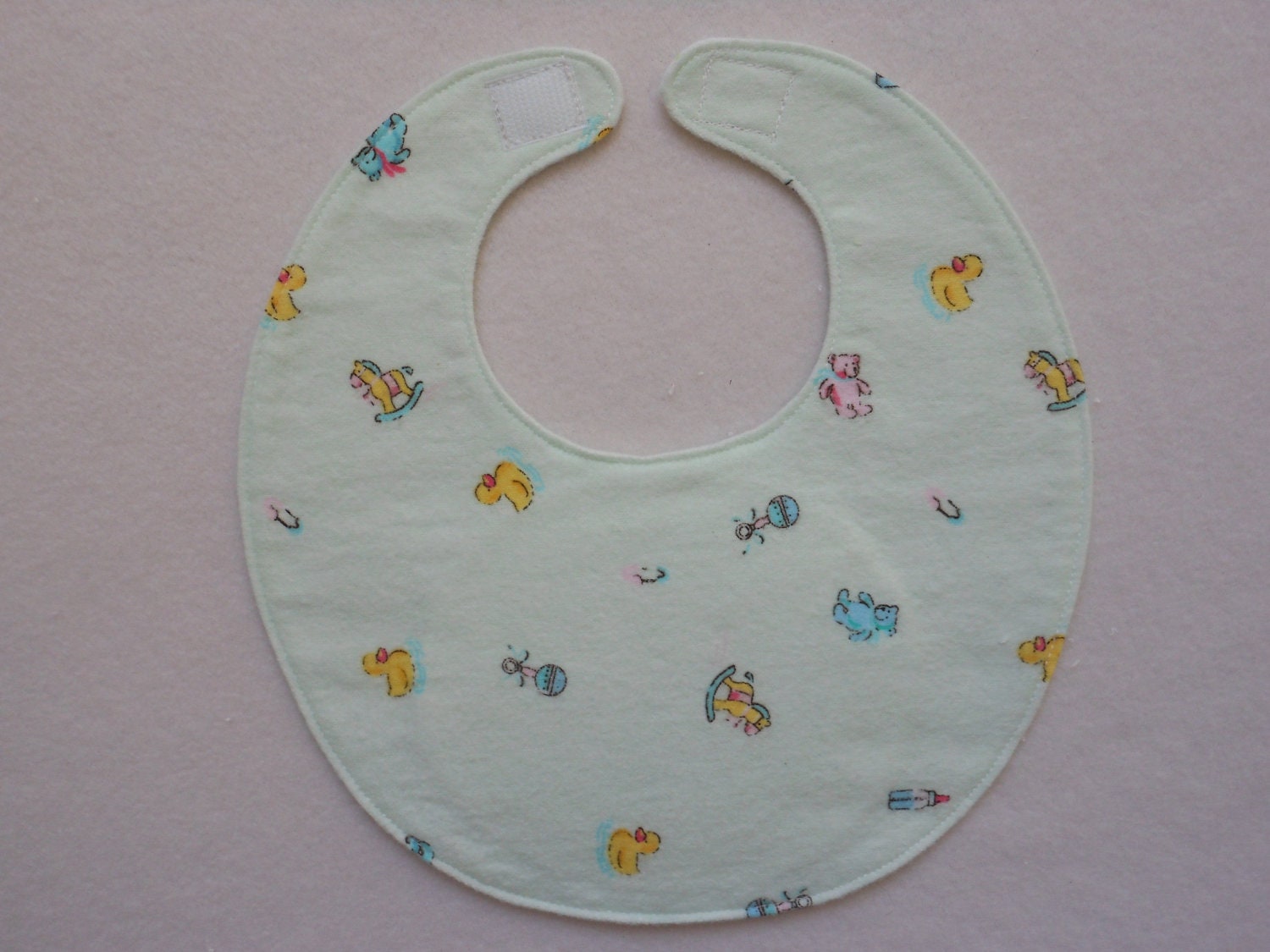 Baby bib, four thick soft layers, reversible, aqua with tiny duckys and teddys