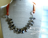 Shades of GREY  /  asymmetric grey, glass beaded necklace on orange ribbon