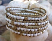 Chan luu inspired beaded leather wrap bracelet .Wrap bracelet.White beads and gold nugget on light brown cord.