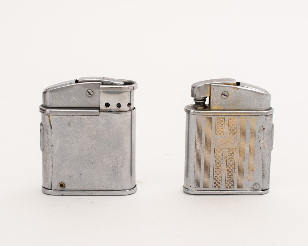 Pair of Working 1950s Japanese Squeeze Trigger Chromium Pocket Lighters