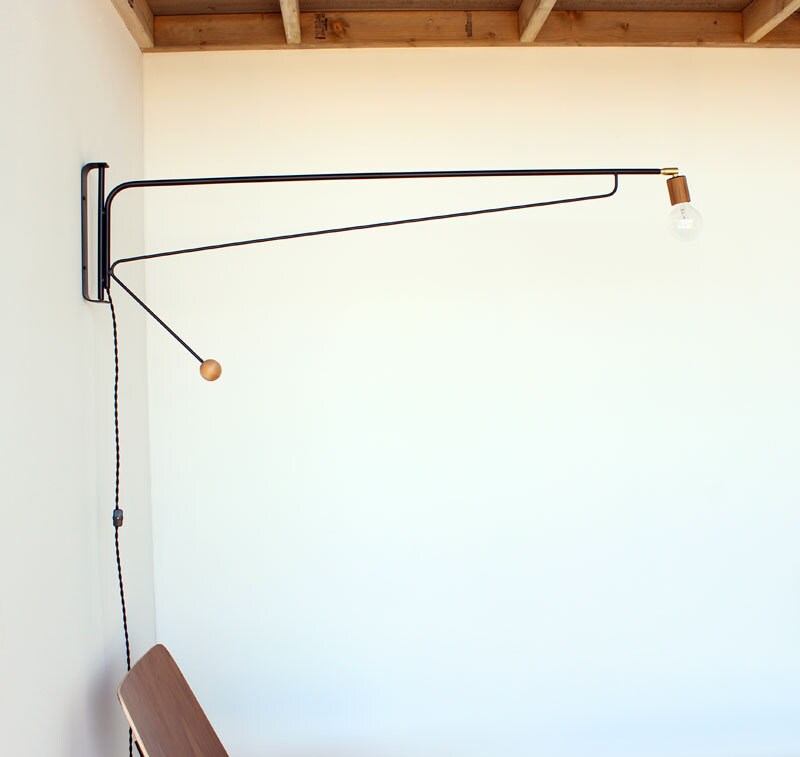 Otis light: 48" black with swiveling Teak socket