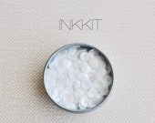 white sequins (1/2 oz)