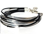 Black Leather Bracelet with Curved Silver-plated Tube Beads