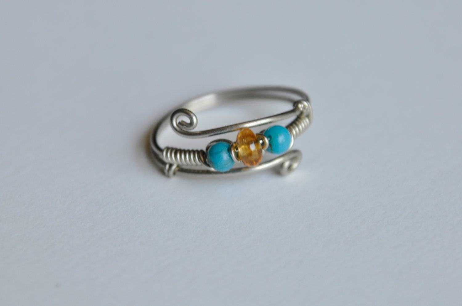 Wrapped wire ring, yellow & blue stone beads, nickel silver wire, adjustable