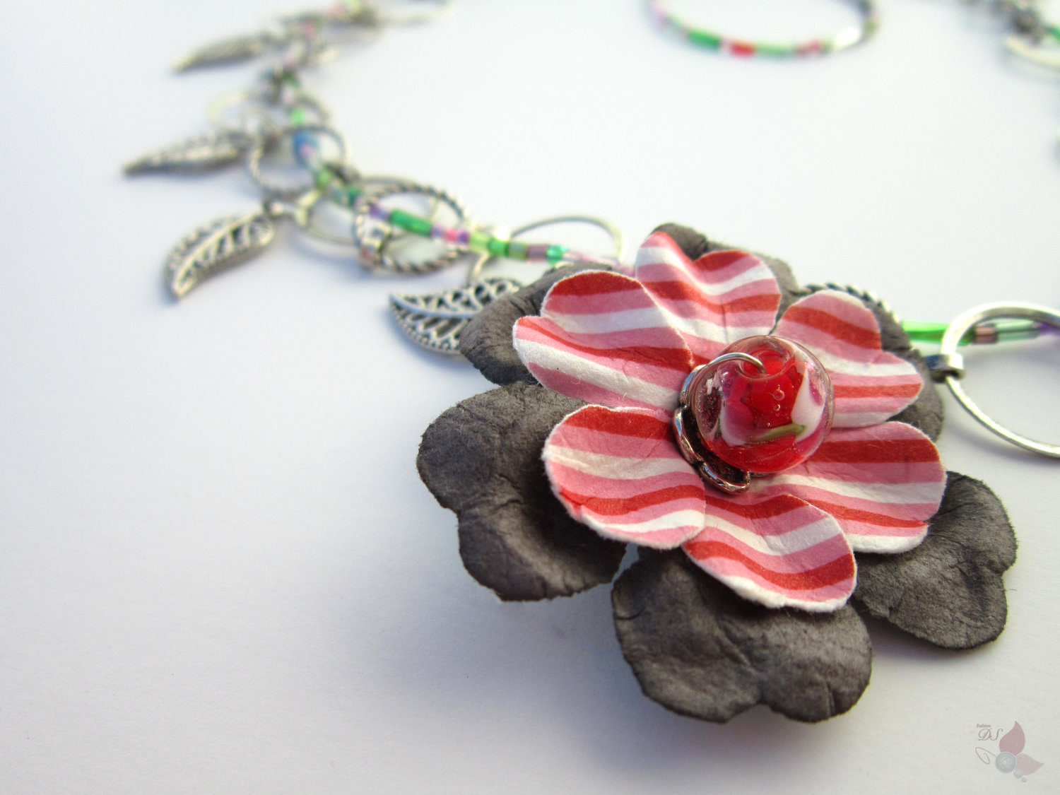 On Sale Necklace with Flower on the Side and Dangling Leaves and a Seed Bead Thread