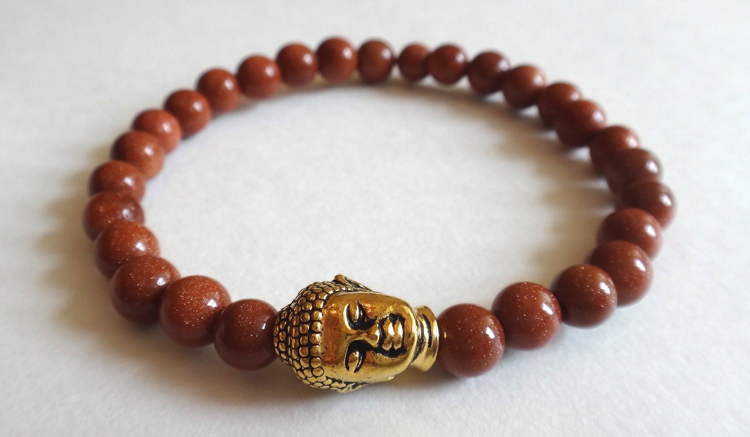 Brown Goldstone Beaded Bracelet with Gold Buddha