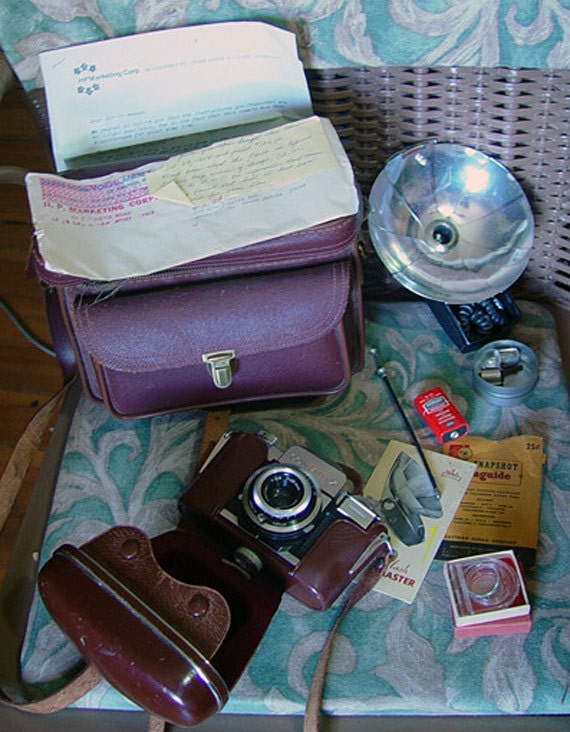 1958 Zeiss Icon Contaflex 35mm SLR camera with flash, case, bag, filter, and documents. New Year Sale