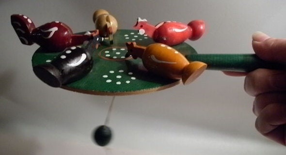 A Vintage Handcrafted Chicken Paddle Toy - Folk Art from Poland