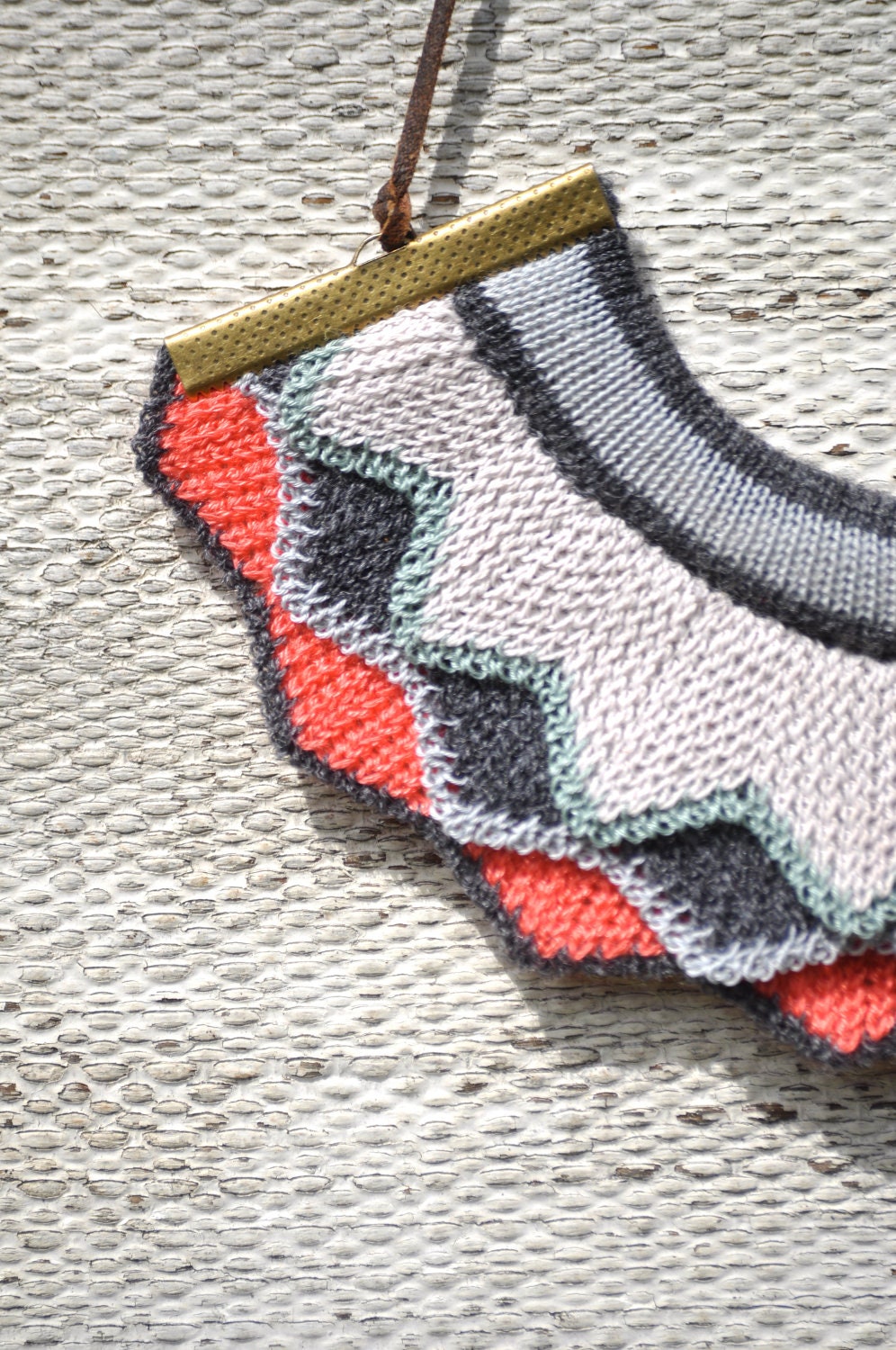 Harlequin knitted necklace - Bright Coral