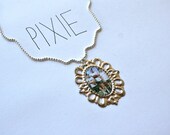 Freaks and GEEKS cameo necklace