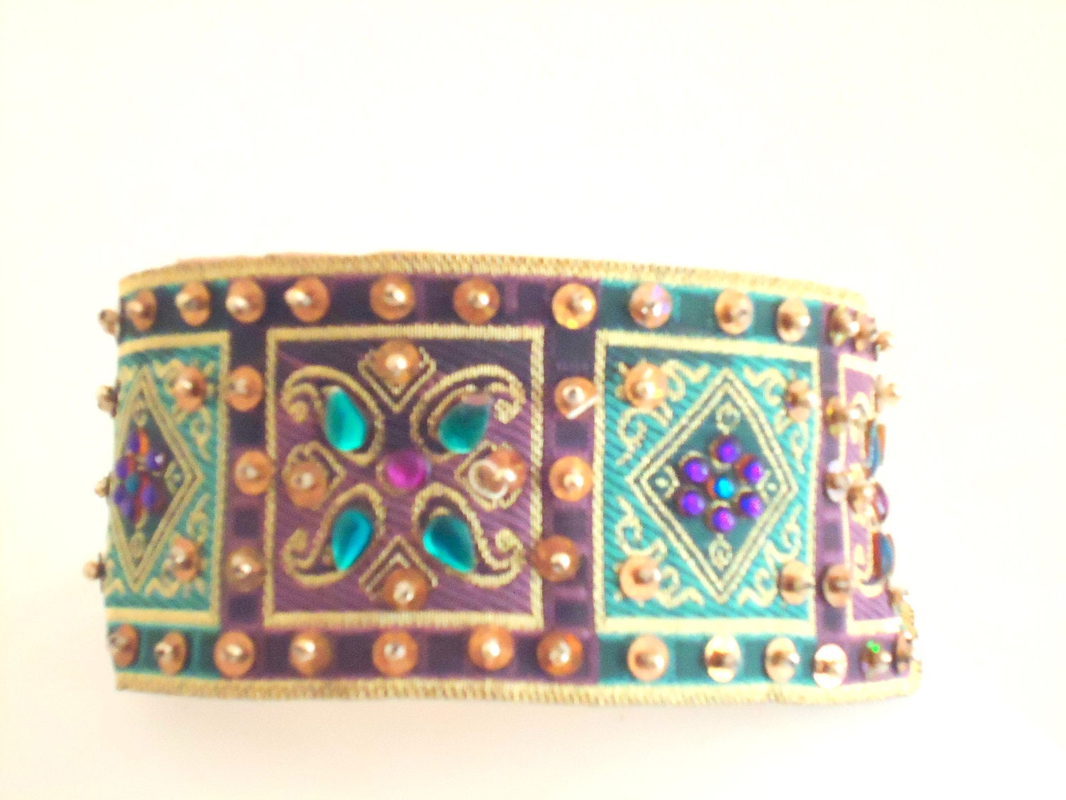 Couture dog collar.Egyptian style embroidered cloth with faux gems and sequins.