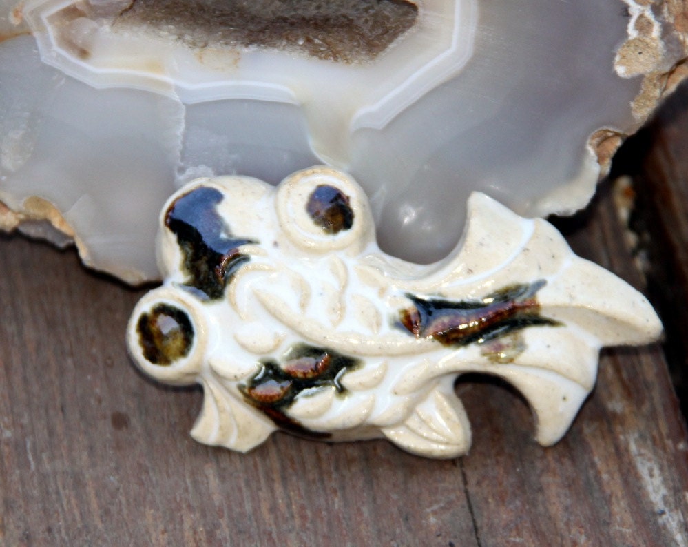 Small Ceramic Goldfish wall art, fountain decor, or shelf sitter.