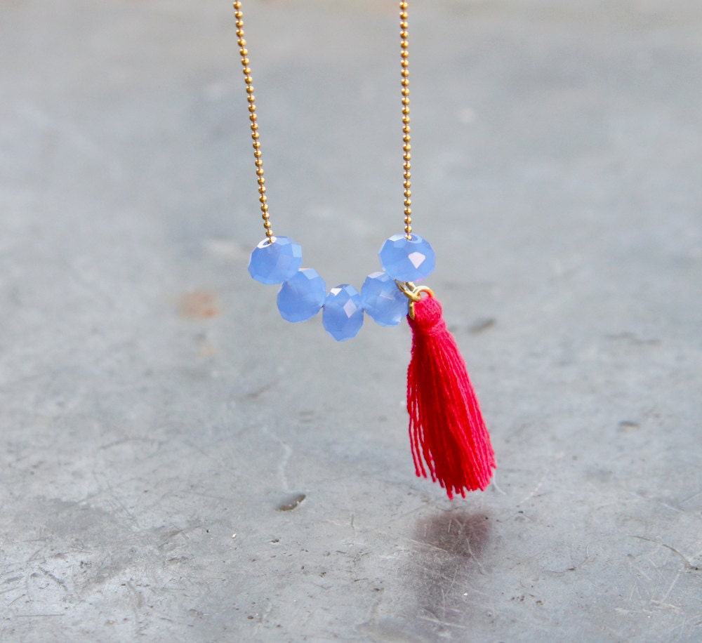 Long necklace with with pink tassel and dusk blue crystal beads on gilded ball chain