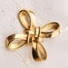 Vintage Signed Trifari Brushed Gold Tone Double Knot Brooch